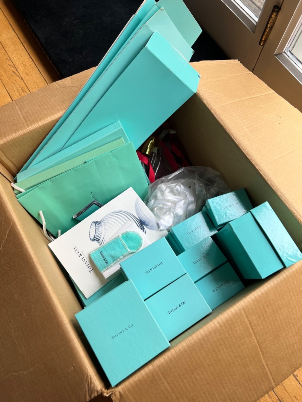 Large lot of Tiffany & Co. Boxes, ribbons, pouches, etc.